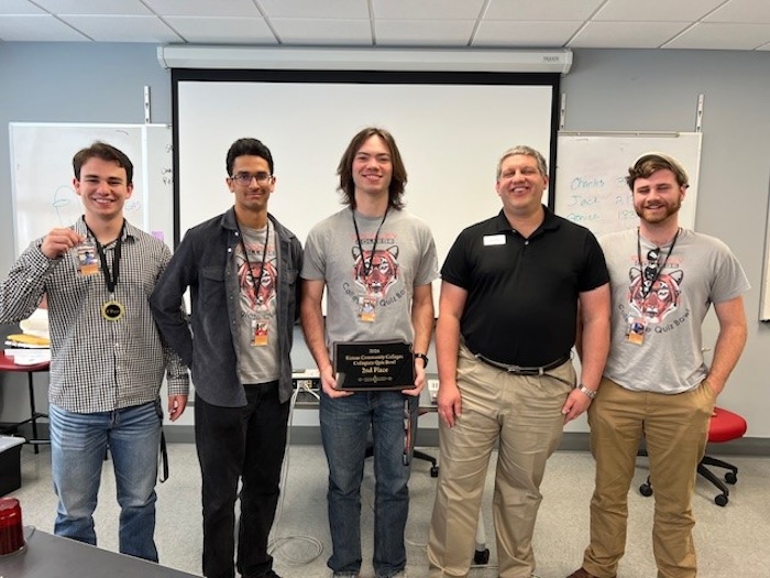 Collegiate Quiz Bowl A-team - Spencer MacLaughlin (SO); Laurence Aggson (SO); Elias Robson (SO) Captain; Award given by Chad Kubicek, NAQT moderator; and William 