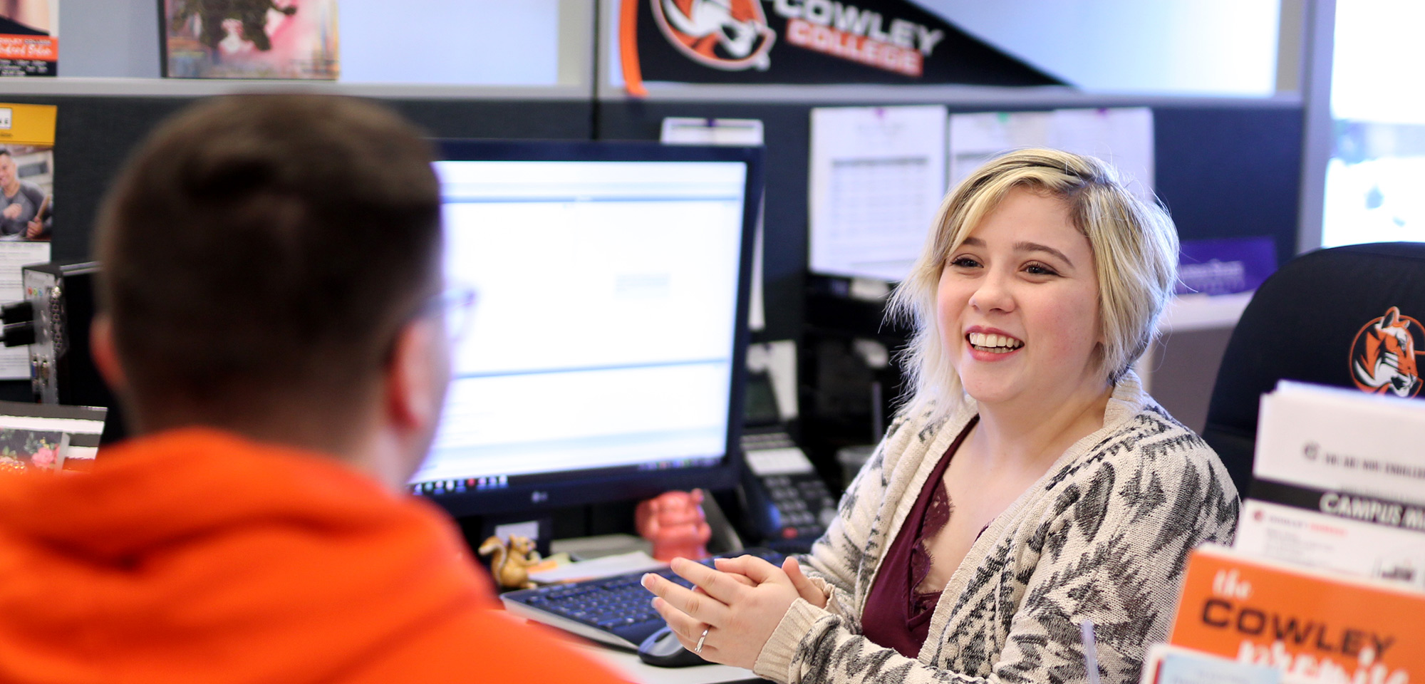 student with cowley college admissions representative