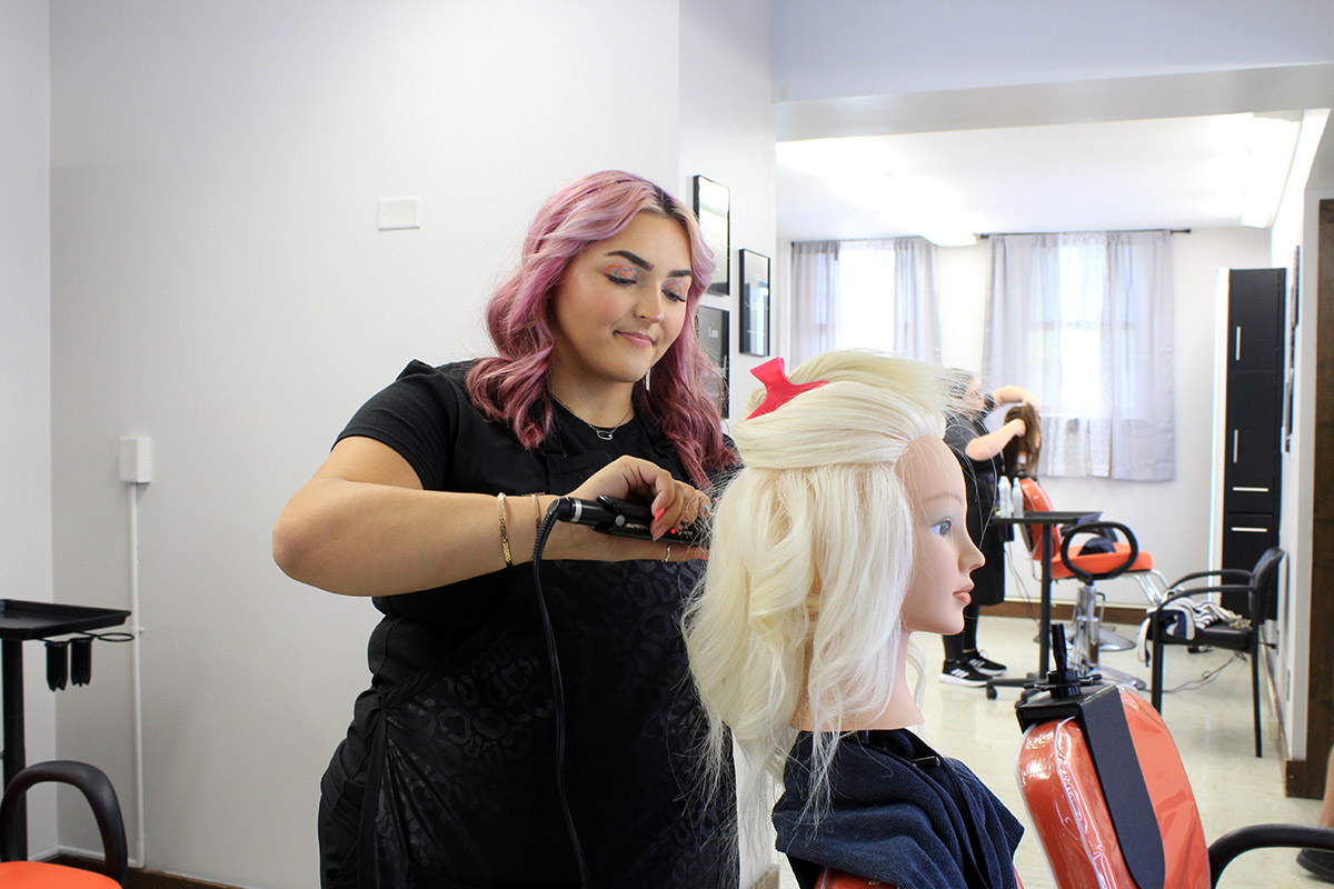 student in the hair salon