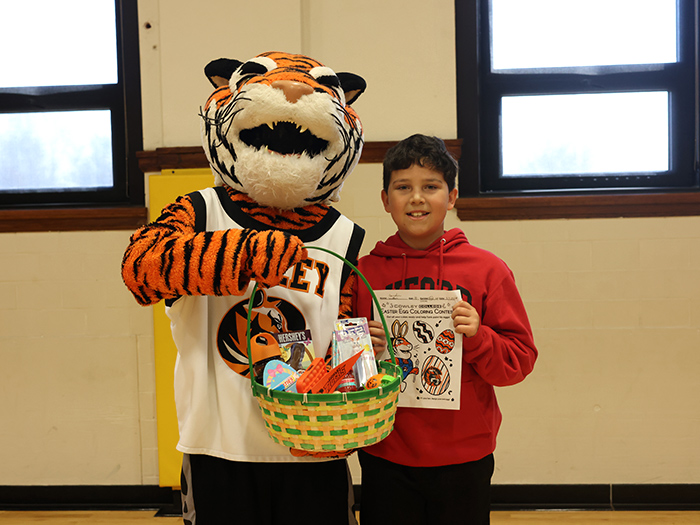 Camdin Walker with Tank the Tiger