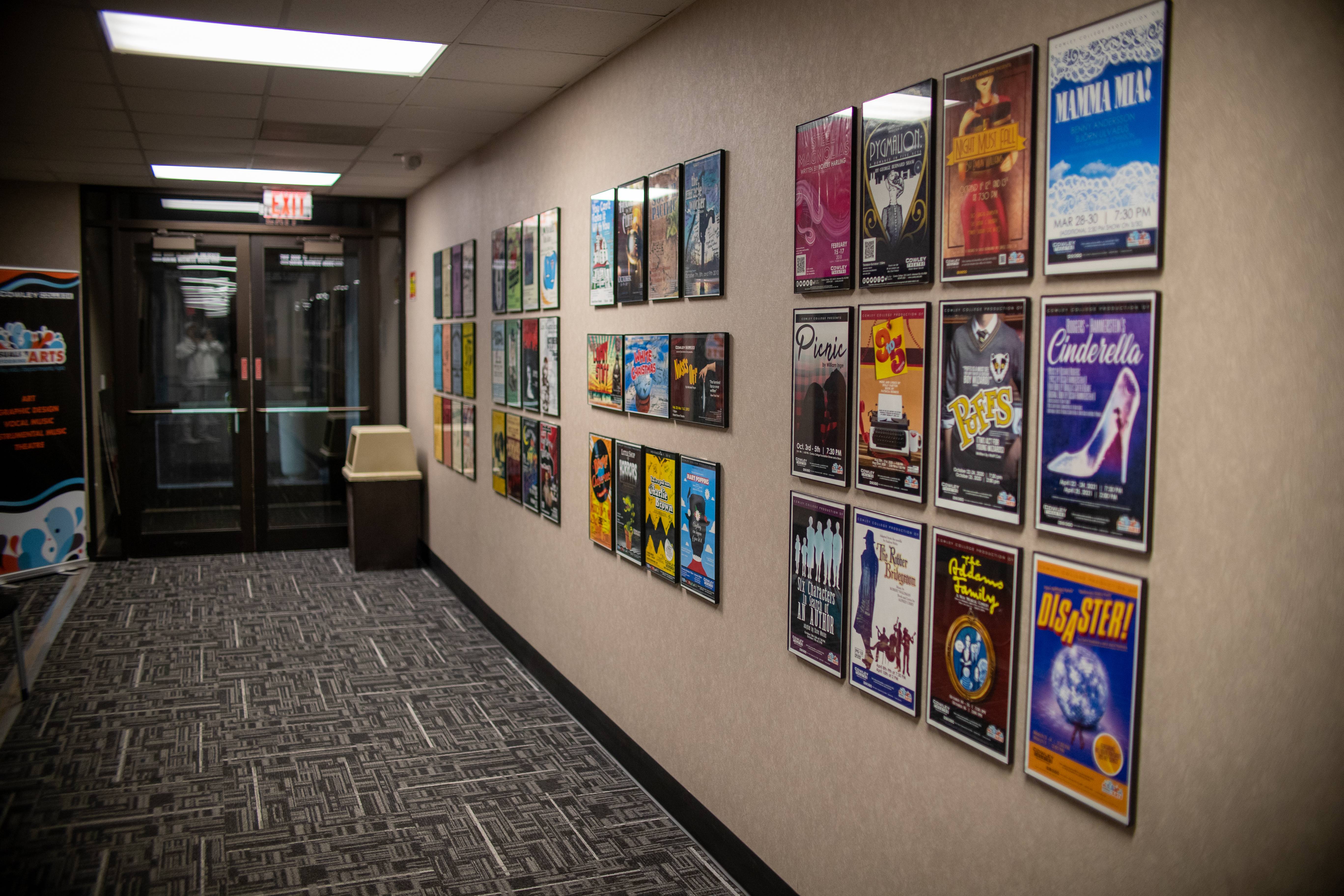 hallway with show posters