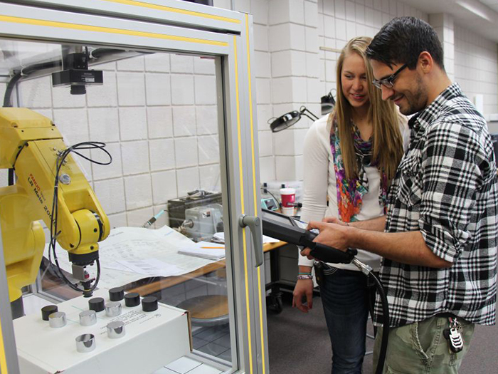 students in a robotics lab
