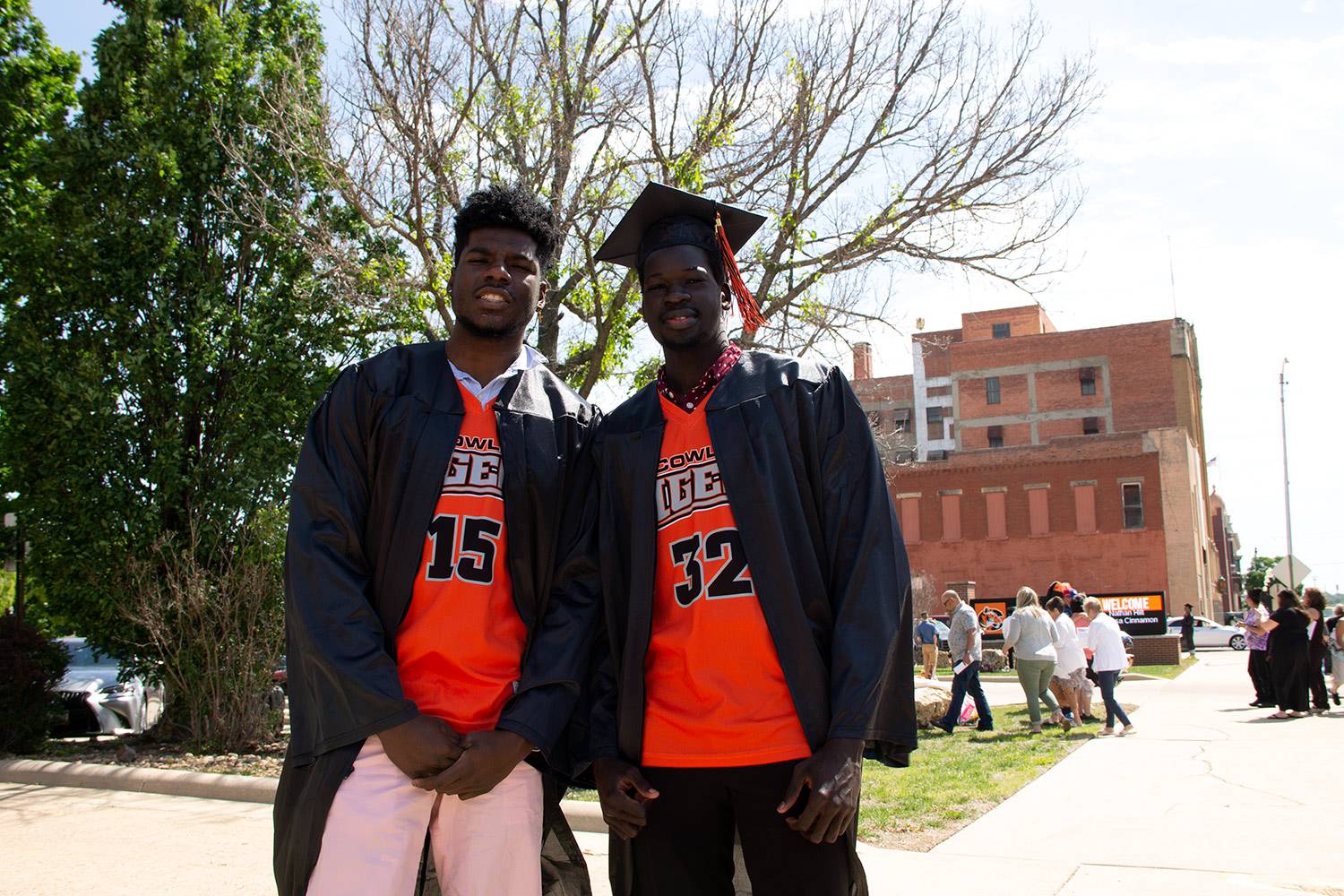 students in basketball jerseys at commencement